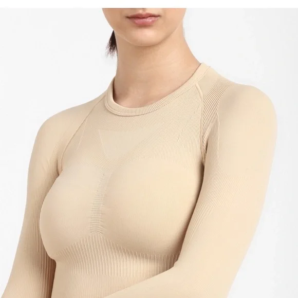 ADIDAS
Women Solid Round Neck Beige T-Shirt - Picture 5 of 9